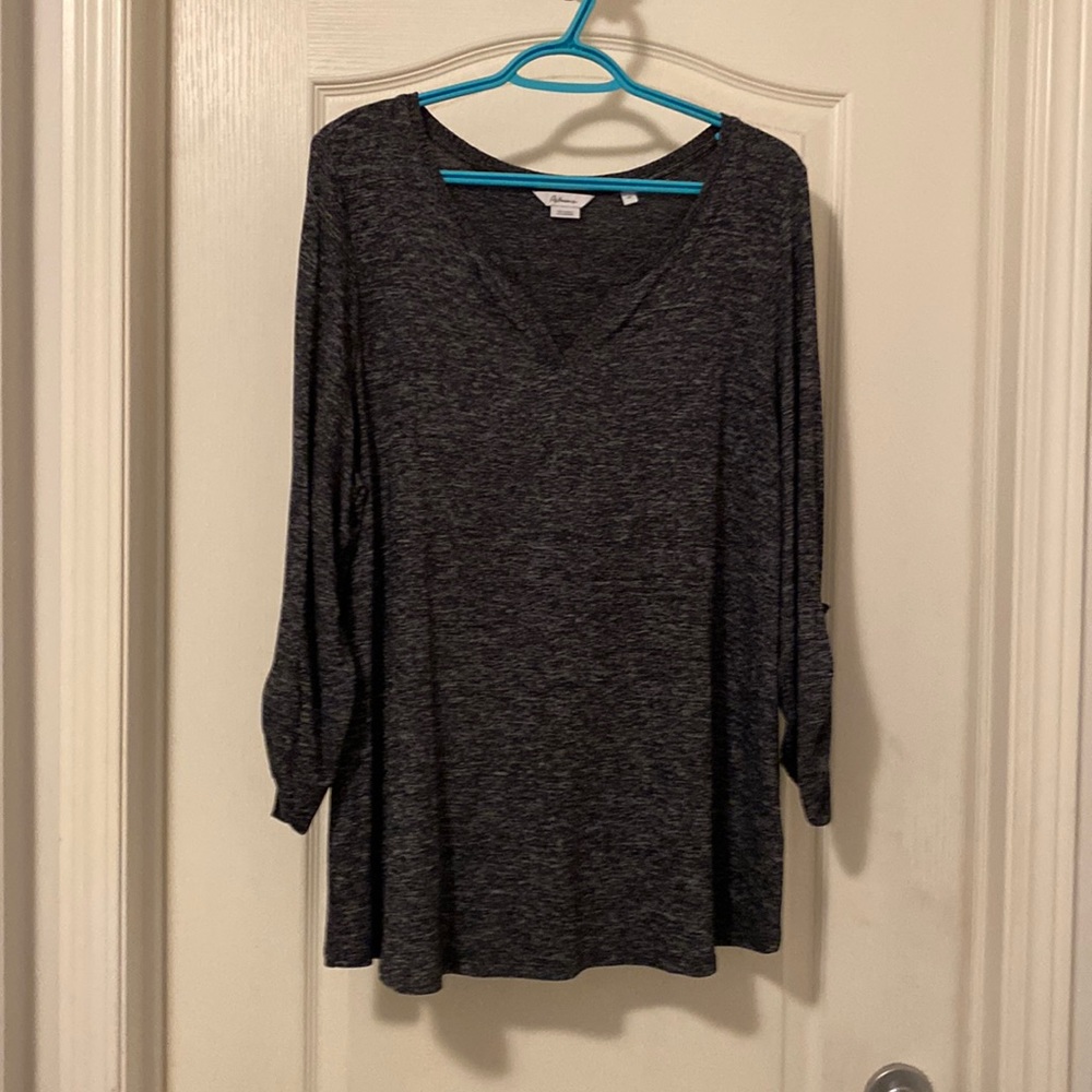 Reitman’s navy top with button up sleeves